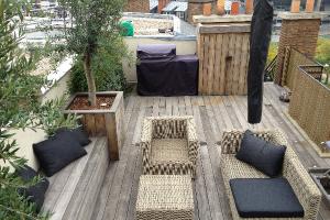 Aménager un toit-terrasse avec une terrasse bois. Paris 75016