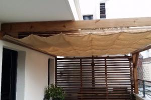 Pergola bois et solution d'ombrage en velum