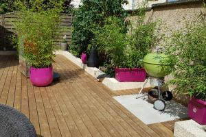 Rénovation d'une terrasse en composite en une terrasse en bois.