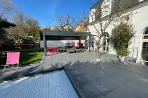 Terrasse minérale en grès cérame et aménagement de jardin à Créteil 94