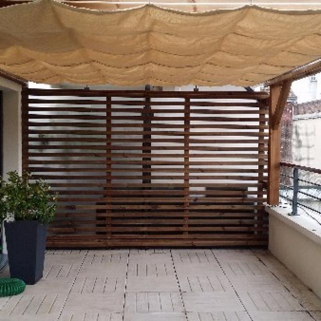 Pergola bois et solution d'ombrage en velum